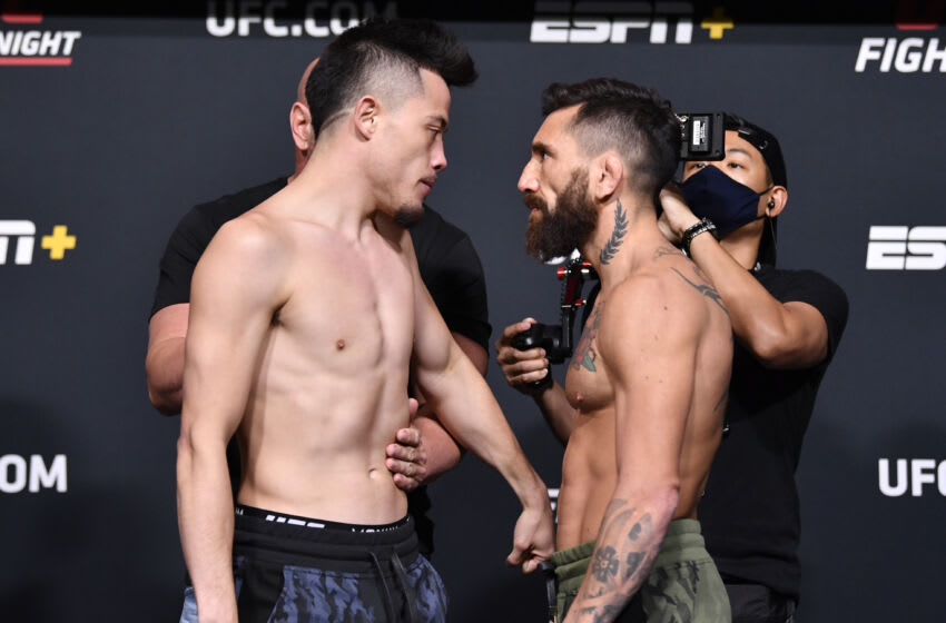 LAS VEGAS, NEVADA - 27 DE AGOSTO: (LR) Los oponentes Mana Martinez y Guido Cannetti de Argentina se enfrentan durante el pesaje de UFC Fight Night en UFC APEX el 27 de agosto de 2021 en Las Vegas, Nevada.  (Foto de Chris Unger / Zuffa LLC)