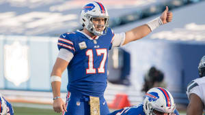 Josh Allen hace un gesto con el pulgar hacia arriba en la línea de golpeo durante un juego de 2020 contra los Seahawks