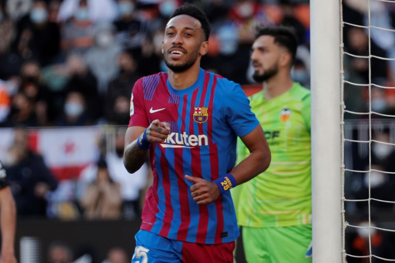 epa09774589 Barcelona's striker Pierre-Emerick Aubameyang celebrates after scoring the 0-3 goal during the Spanish LaLiga soccer between Valencia CF and FC Barcelona at Mestalla stadium in Valencia, eastern Spain, 20 February 2022. EPA-EFE/Manuel Bruque