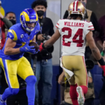 Cooper Kupp de los Rams de Los Ángeles, a la izquierda, atrapa un pase de touchdown frente a K'Waun Williams de los 49ers de San Francisco durante la segunda mitad del partido de fútbol americano de la NFL por el campeonato de la NFC el domingo 30 de enero de 2022 en Inglewood, California.