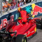 Carlos Sainz climbs out of his F1-75 after crashing into the barrier. Miami May 2022