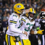 Aaron Rodgers, Aaron Jones, Empacadores de Green Bay.  (Foto de Scott Taetsch/Getty Images)