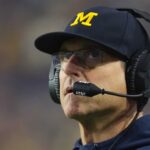 John Harbaugh aborda el futuro de entrenador del hermano Jim en Michigan