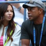 Tiger Woods con su novia Erica Herman