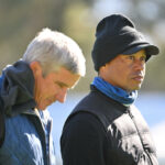 Tiger Woods y Jay Monahan