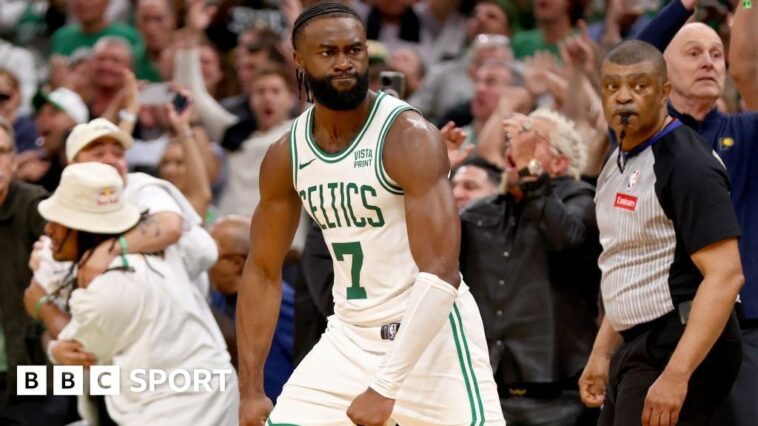 Jaylen Brown celebrates scoring