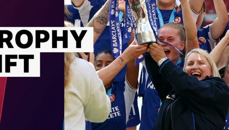 Chelsea manager Emma Hayes lifts the WSL trophy in her final game in charge