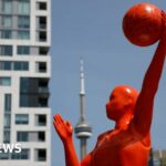 A 12-foot-tall sculpture of the WNBA logo is pictured at the Stackt Market in Toronto ahead of Canada's first WNBA game set for May 13, 2023. Toronto Star/Lance McMillanMay-10-2023