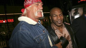 Hulk Hogan y Mike Tyson (derecha) llegan al estreno de "Hacerse rico o muere en el intento'" en 2005