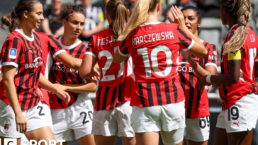 AC Milan players celebrate scoring a goal