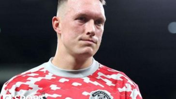 Phil Jones wearing a Manchester United training top