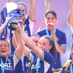 Chelsea's Erin Cuthbert and Niamh Charles lift the Women's Super League trophy