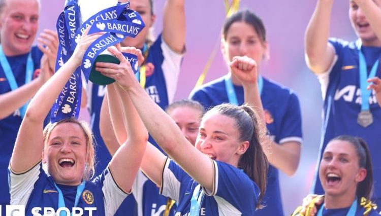 Chelsea's Erin Cuthbert and Niamh Charles lift the Women's Super League trophy