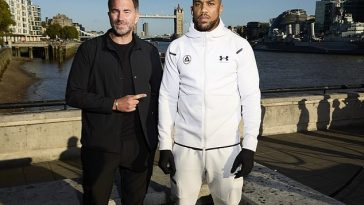 Eddie Hearn comparó a Anthony Joshua, a la derecha, con su propio equipo, el Tottenham Hotspur.