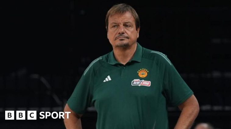 Ergin Ataman wearing a green t-shirt