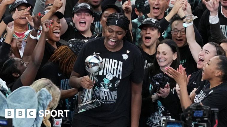 Jonquel Jones celebrates New York Liberty winning the WNBA title