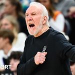 Gregg Popovich giving instructions courtside for the San Antonio Spurs