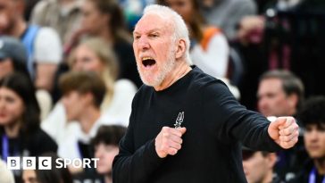 Gregg Popovich giving instructions courtside for the San Antonio Spurs