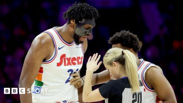 Joel Embiid, of the Philadelphia 76ers, confronts referee Jenna Schroeder in his side's win against the San Antonio Spurs