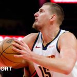 Nikola Jokic drives for the basket against the Atlanta Hawks