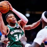 Giannis Antetokounmpo shooting a basket against the Toronto Raptors