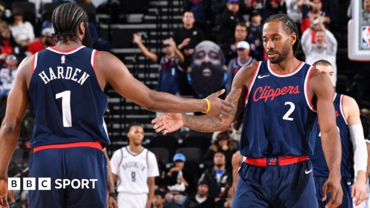 James Harden and Kawhi Leonard celebrate